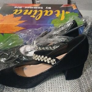 Has stain on sole. Italina Black Heels with Elegant Pearl Detail